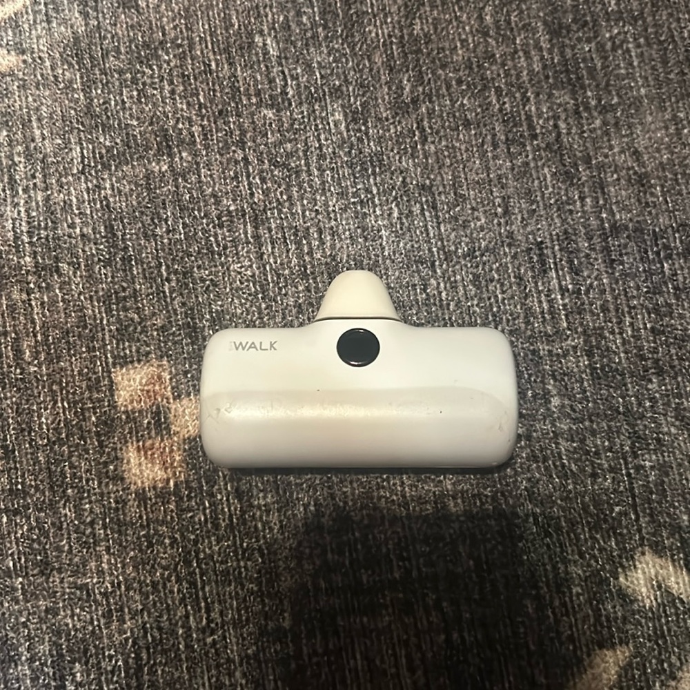 Nice white portable charger for lightning porthole. model 14 and under.(APPLE)